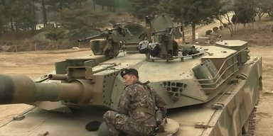 ДНК "Абрамса": в Южной Корее танк K1A2 "подружили" с боевой машиной K21 и K2 Black Panther (видео)