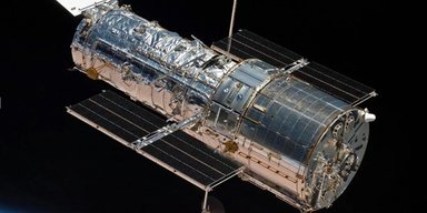 Телескоп Габбл став свідком космічної катастрофи: дві галактики були спіймані "на гарячому" (фото)