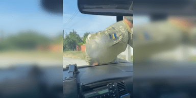 "Незрозуміла ситуація": на Київщині водій "прокатав" на капоті військового, — соцмережі (відео)