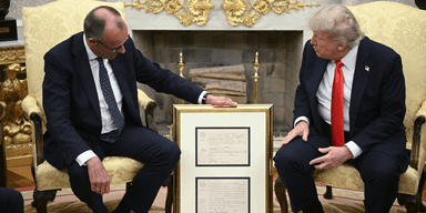 Мерц подарил Трампу свидетельство о рождении его деда: что о нем известно (видео)