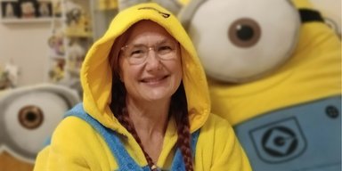Татуювання, одяг та іграшки: австралійка, "одержима" міньйонами із мультфільму, не може зупинитися (фото)