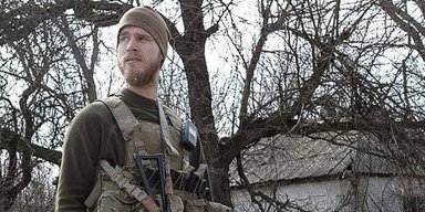 Обвиняют в убийстве: американца, который воевал против РФ, экстрадировали из Украины в США