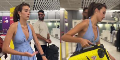 Пассажирка самолета перехитрила лимит по багажу, сделав немыслимое с чемоданом (видео)