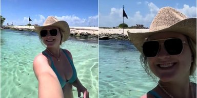 Невнимательная женщина плавала в океане, не заметив, что происходит позади нее (фото)
