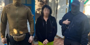 "Залягла на дно" на Київщині: викрили жінку, яка співпрацювала з РФ в Херсонській області (фото)