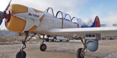 Летающая "дронобойка": зачем россияне установили карабин "Сайга" на самолет Як-52 (видео)