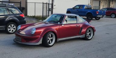 Українець перетворив вінтажний Porsche на надшвидкісний електрокар (відео)