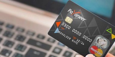 Клієнти платіжної системи Payoneer зможуть виводити гроші через Приват24