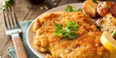 Простой способ приготовить мясо вкусно: рецепт традиционного немецкого шницеля