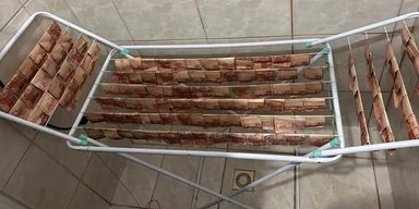 Бразильские полицейские показали, как выглядят по-настоящему отмытые деньги (фото)