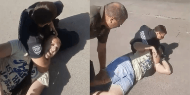 У Києві посеред вулиці "запакували" чоловіка: у поліції розповіли, що сталося (відео)