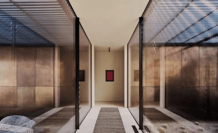 Современная вилла посреди пустыни с мостом и бассейном в скалах