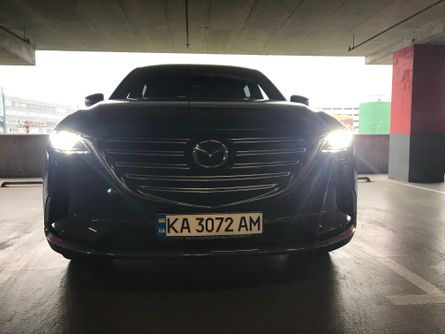 Мазда СХ-9, вид спереди, фары, решетка радиатора, фото