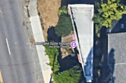 Очень узкий дом в США, Дом злобы, жена отомстила мужу, бывший муж, развод, спор за землю, земельный участок, крошечный дом