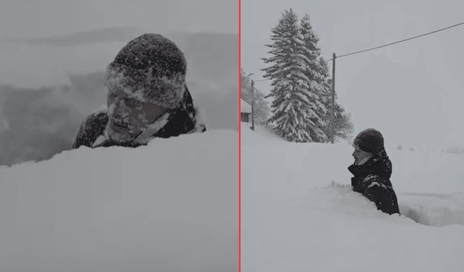 Под два метра рыхлого снега: мужчина поразил сеть, показав последствия непогоды (видео)