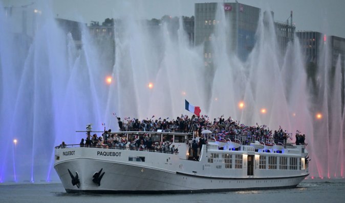 Открытие Олимпиады-2024: лодочная флотилия, колокола Нотр-Дама и зрители под дождем (фото)