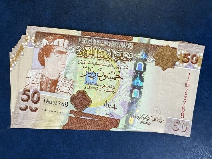 ливийский динар, муаммар каддафи