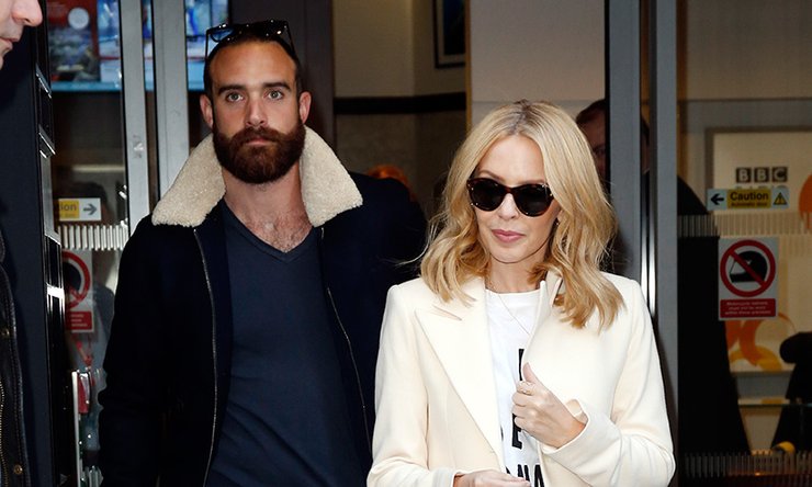 Кайлі Міноуг і Джошуа Сасс