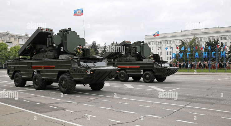 оси на параді