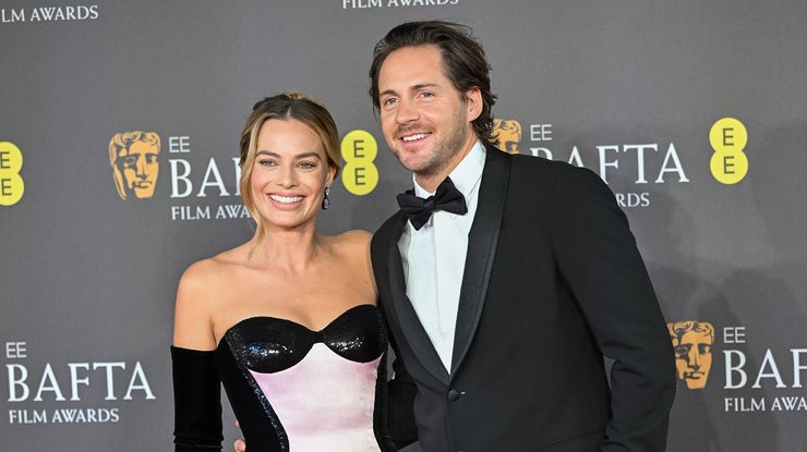 Марго Робби и Том Акерли