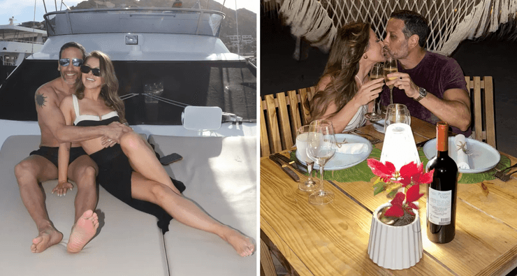 Пара целуется за столиком на романтическом ужине с вином и свечами