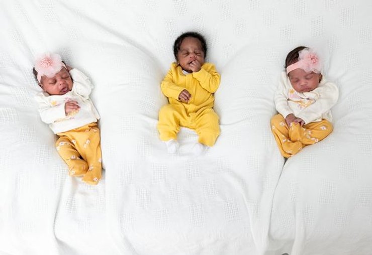 тройня, США