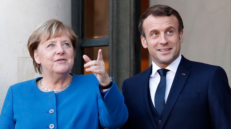 Меркель и Макрон во время саммита "нормандской четверки" в Париже, декабрь 2019 года