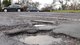 Рекордна компенсація: водій відсудив $1,35 мільйона за яму на дорозі