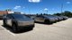 Не хотят покупать: десятки новеньких Tesla Cybertruck хранятся под открытым небом (видео)