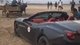 Застряглий у піску суперкар Ferrari витягувала пара волів (відео)