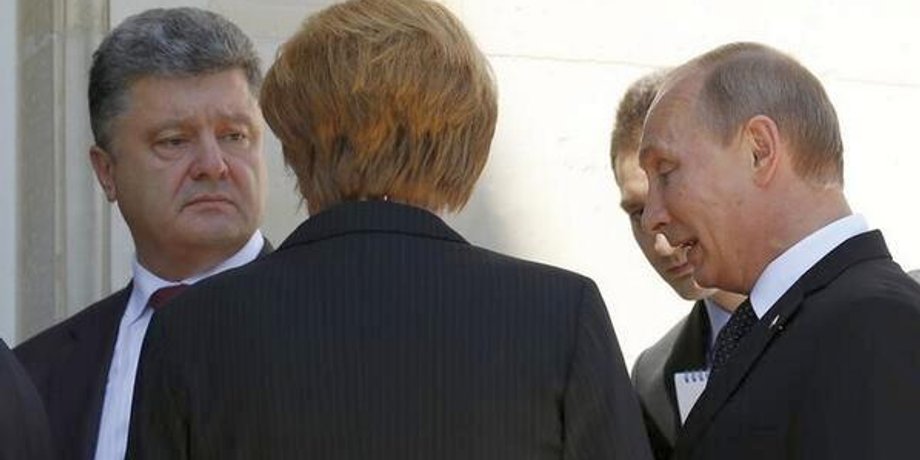 Порошенко, Меркель и Путин в Нормандии / REUTERS