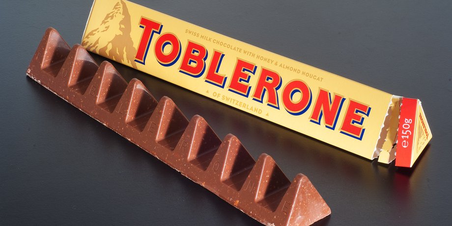 Швейцария, шоколад Toblerone, логотип компании Toblerone, упаковка шоколада