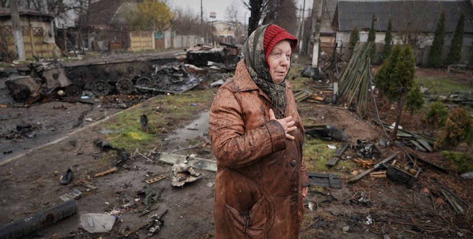 Жительница бучи, зверства в Буче, зверства в Буче фото , разрушения в Буче,