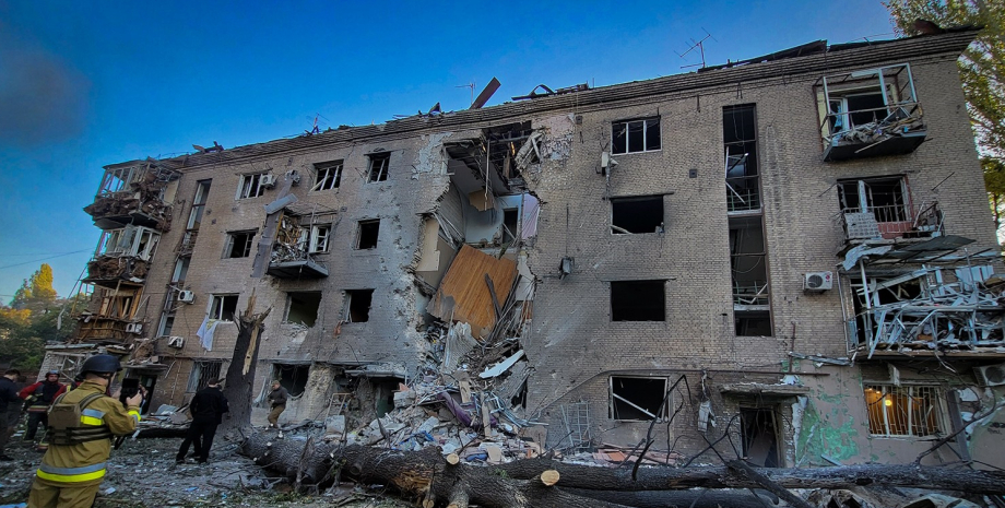 One of the women was clamping between the destroyed structures of the apartment,...