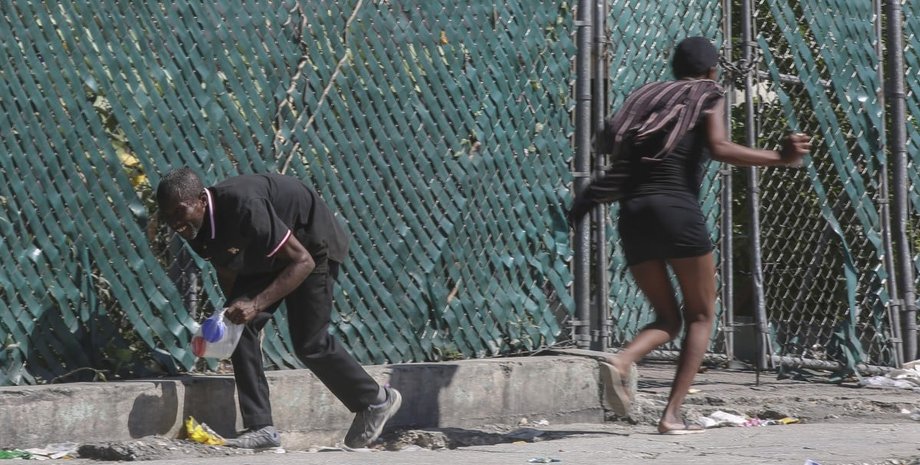 новости мира, гаити, резня, пенсионеры, мачете, банда, колдовство, ребенок