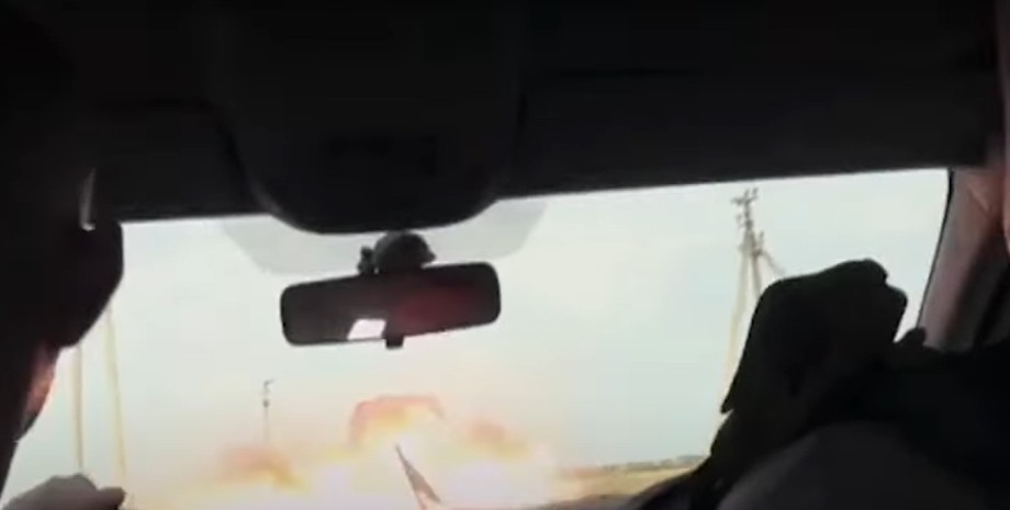 The Russian drone exploded under the wheels of a red evacuation bus, which was t...