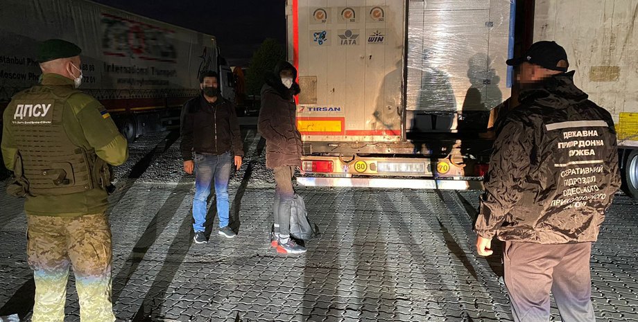 незаконні мігранти, затримання, фото