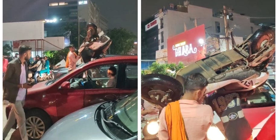 Чоловік поніс над головою свій скутер і обійшов величезний затор у столиці