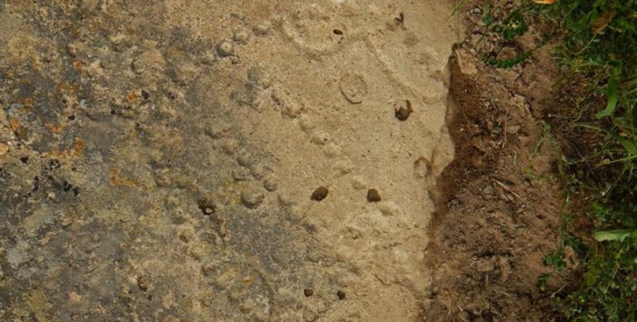 Рисунок на скале - это остатки поля для одной из самых старых игр в мире. Walter Crist/Gobustan National Park