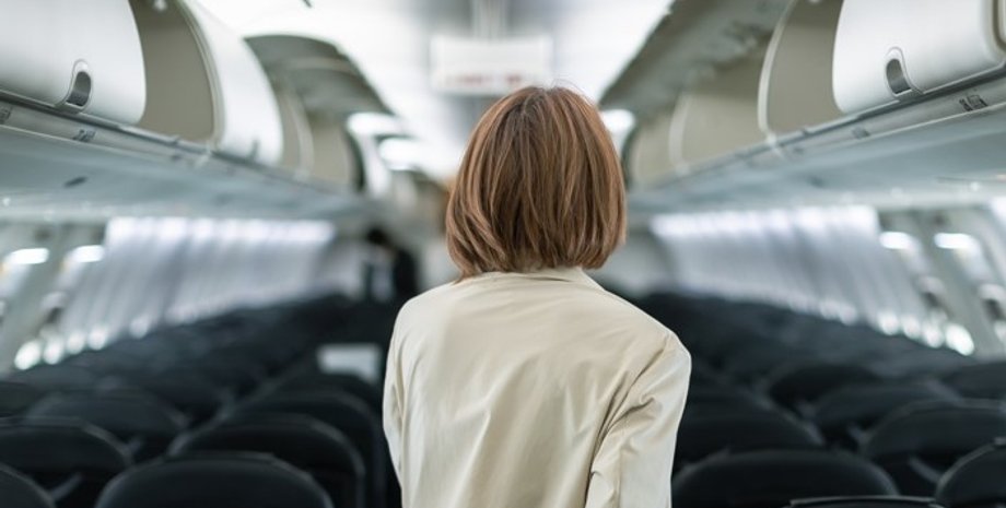 самолет, полет, перелет, туризм, туристка, женщина в самолете