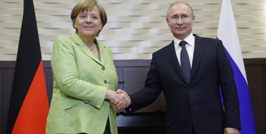 Ангела Меркель и Владимир Путин / Фото: Михаил Метцель/ТАСС
