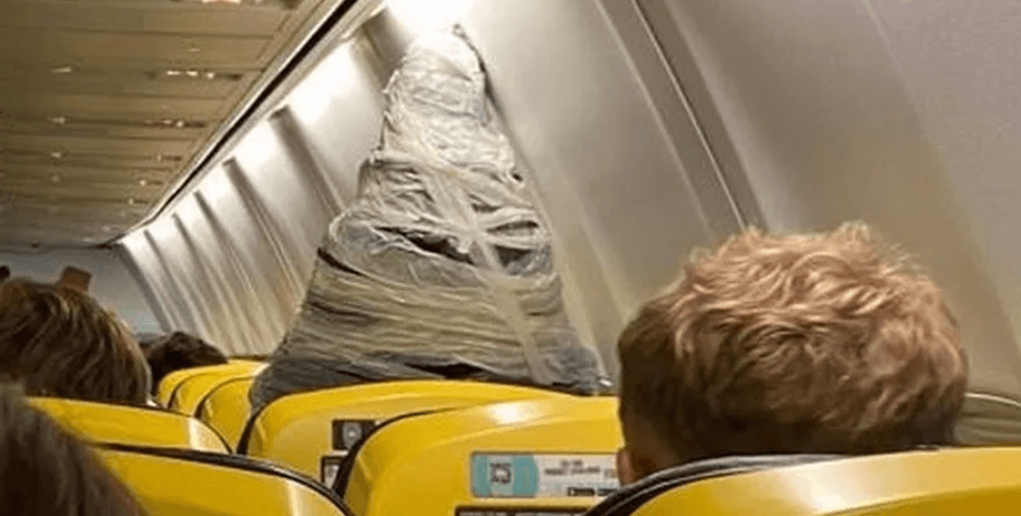 Статуя Діви Марії в літаку, статуя, Діва Марія, з'явилася Діва Марія, проніс у літак статую,