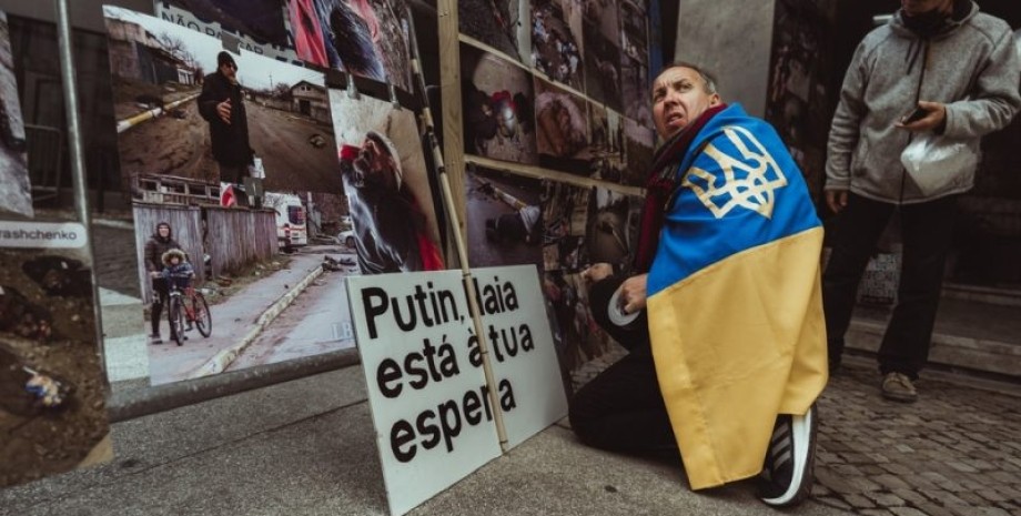 украина, война, флаг, военные преступления, расследование, португалия