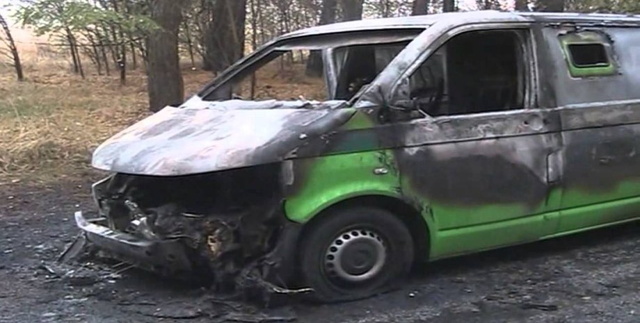 Сожженная машина инкассаторов / Фото: Укринформ