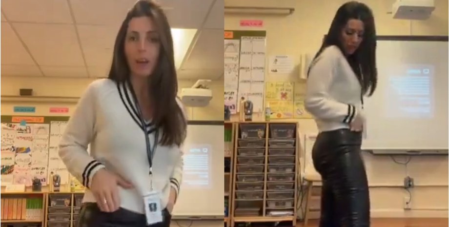 Жінка в класі позує в шкіряних штанах і светрі, її вбрання викликало бурхливе обговорення в мережі