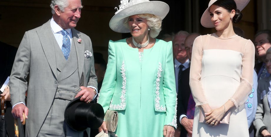 король Чарльз ІІІ, королева Камилла, Меган Маркл