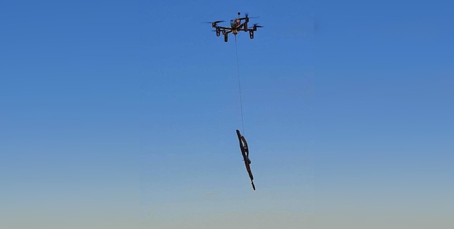 The drone took 4-pound weapons from Russian invaders, picking it up with a speci...