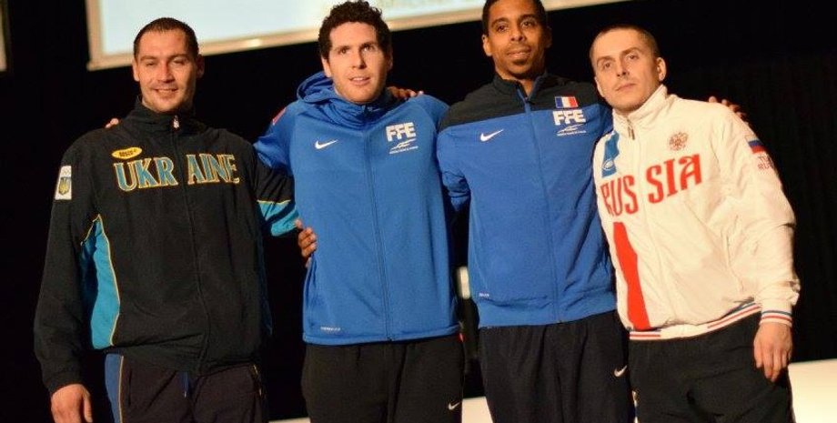 Богдан Никишин (слева) на пьедестале почета / nffu.org.ua