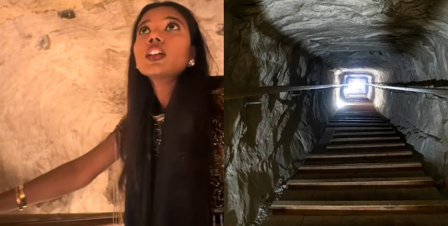 Жінка піднімається вузьким кам'яним коридором усередині Великої піраміди Гізи, показуючи тісні проходи стародавньої споруди