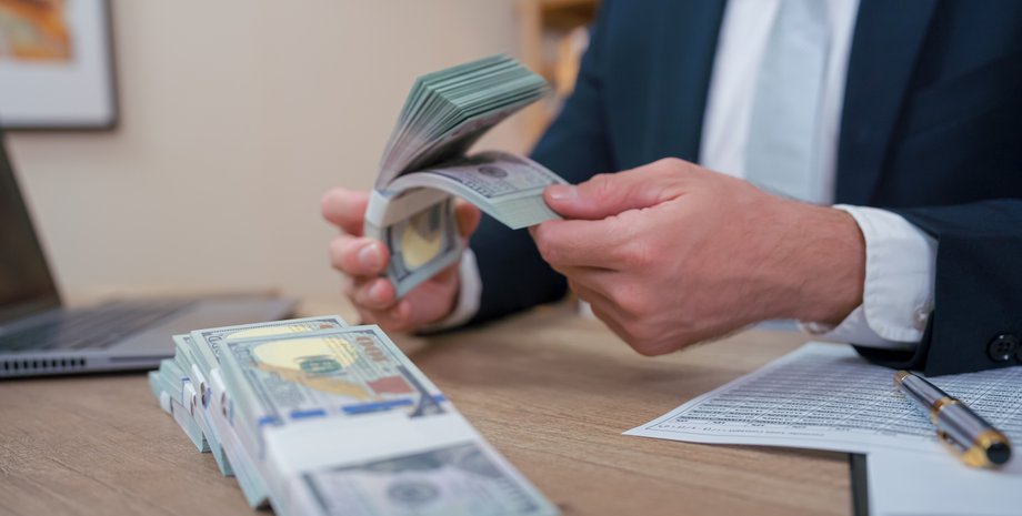 гривна или доллар, покупка валюты, купить доллары, курс покупки валюты в Украине